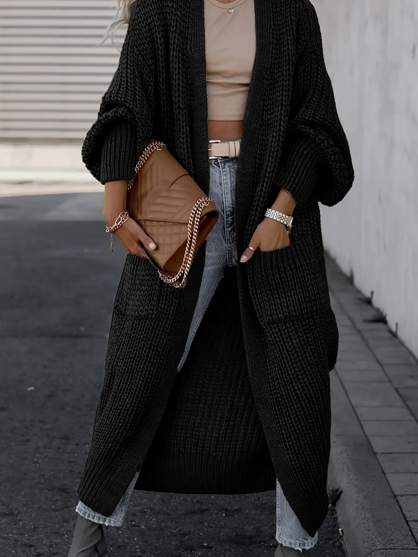 Lang gebreid vest
