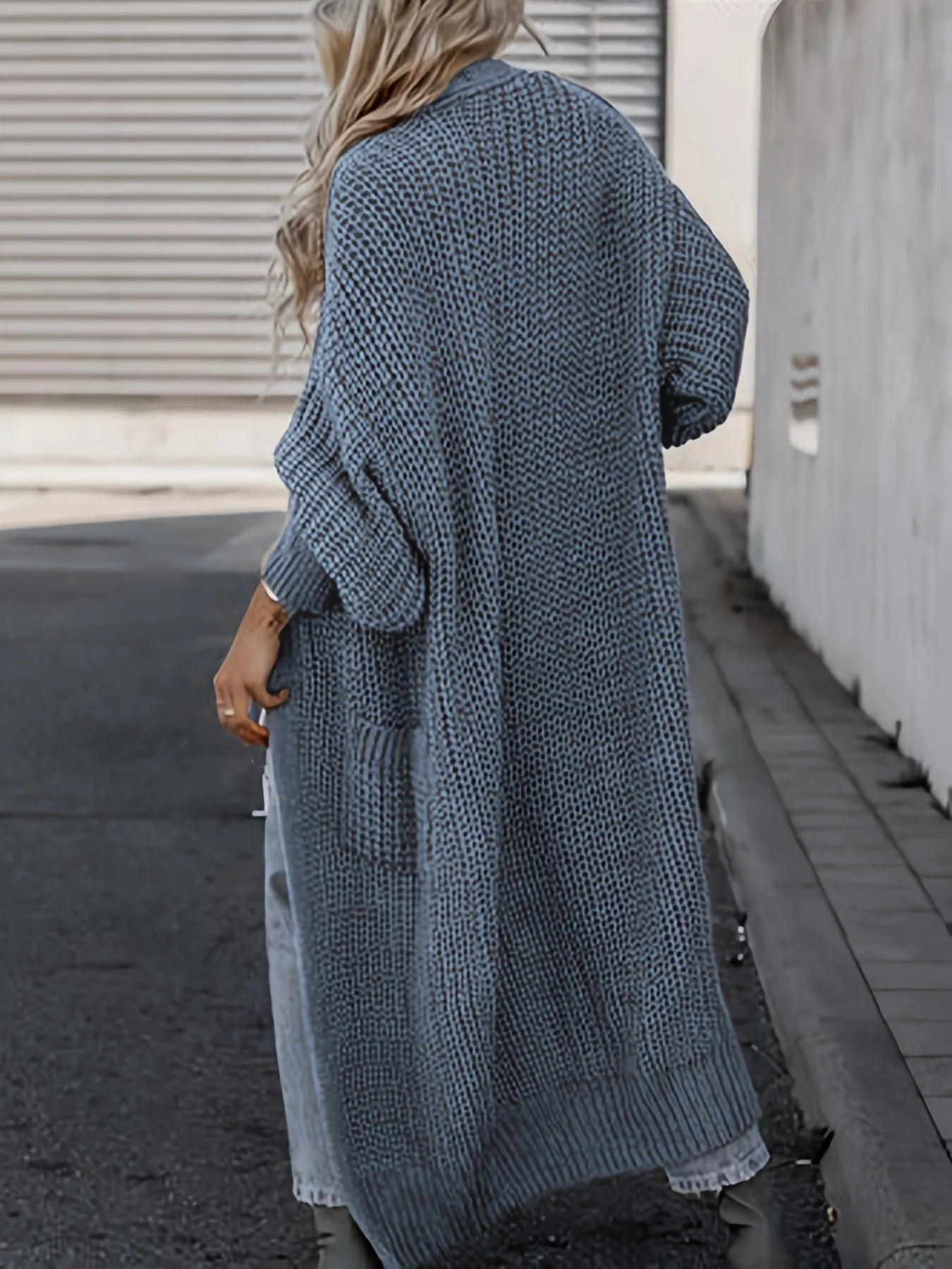 Lang gebreid vest