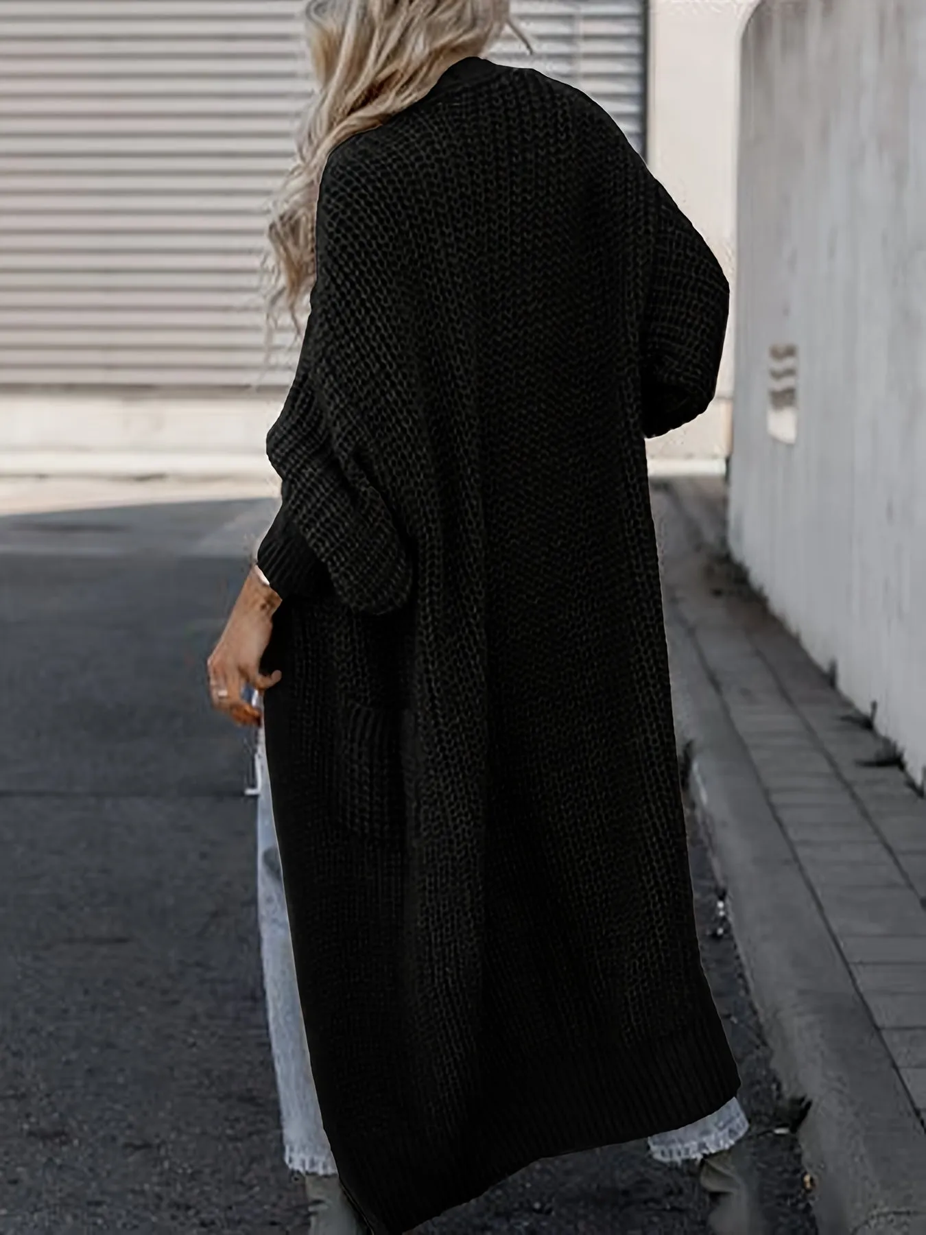 Lang gebreid vest
